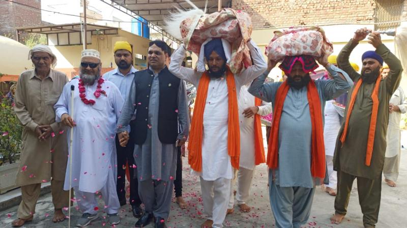 Pakistan Sufi organisation transfers Sikh manuscripts to gurdwara Pakistan Sufi organisation transfers Sikh manuscripts to gurdwara