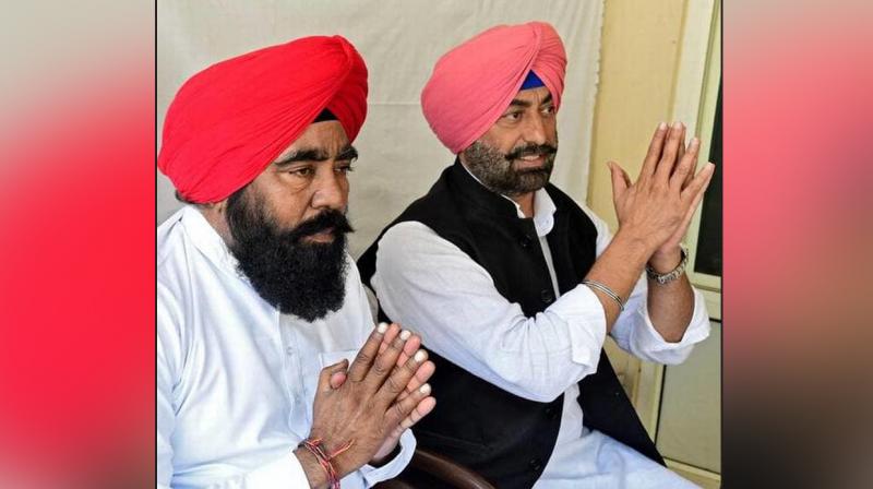 Master Baldev Singh and Sukhpal Singh Khaira