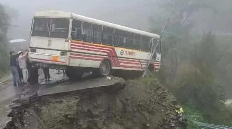 bus hanging on the side of the road on Pathankot Dalhousie Road bus hanging on the side of the road on Pathankot Dalhousie Road