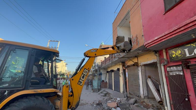 'War on drugs': Batala police demolish drug smuggler's house 'War on drugs': Batala police demolish drug smuggler's house