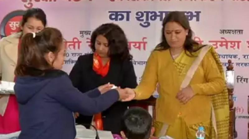 Rekha Arya distributing Panic Button Rekha Arya distributing Panic Button