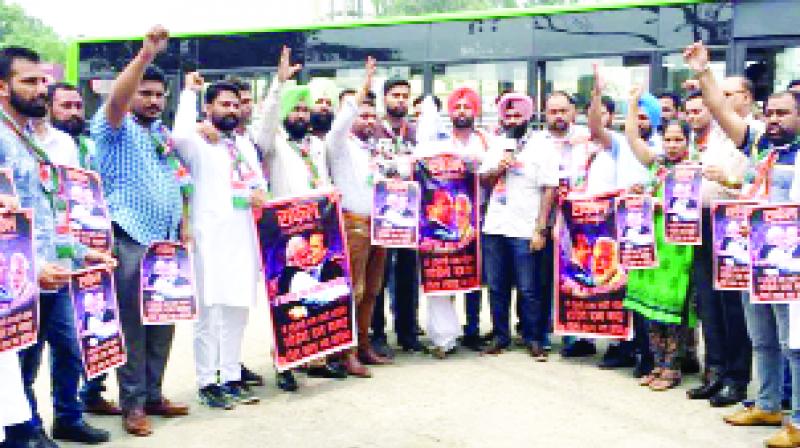 Youth Congress leaders and workers during shouting slogans