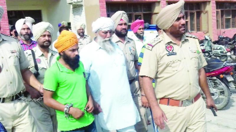 Police taking accused members of Khalistan Movement Police taking accused members of Khalistan Movement