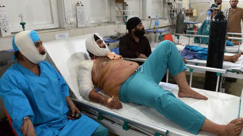 Injured people being treated in hospital Injured people being treated in hospital