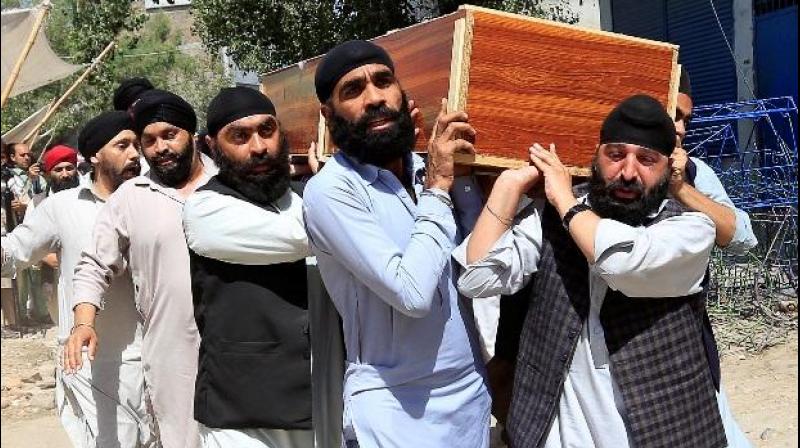 Sikhs Carrying the Body Sikhs Carrying the Body