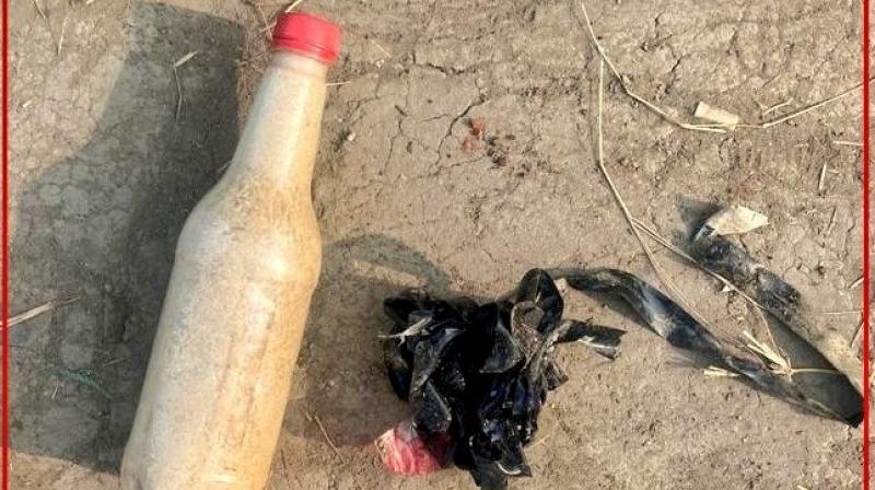 BSF troops recovered one bottle filled with suspected heroin