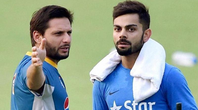 Shahid Afridi with Kohli