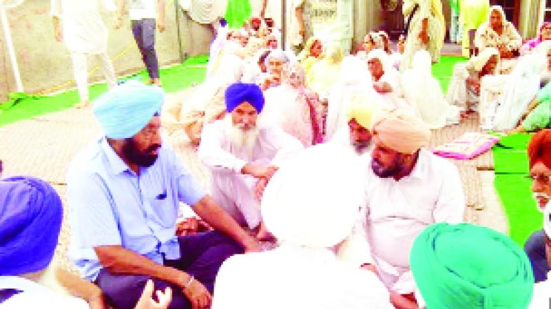 Peoples expressing grief with family members Peoples expressing grief with family members