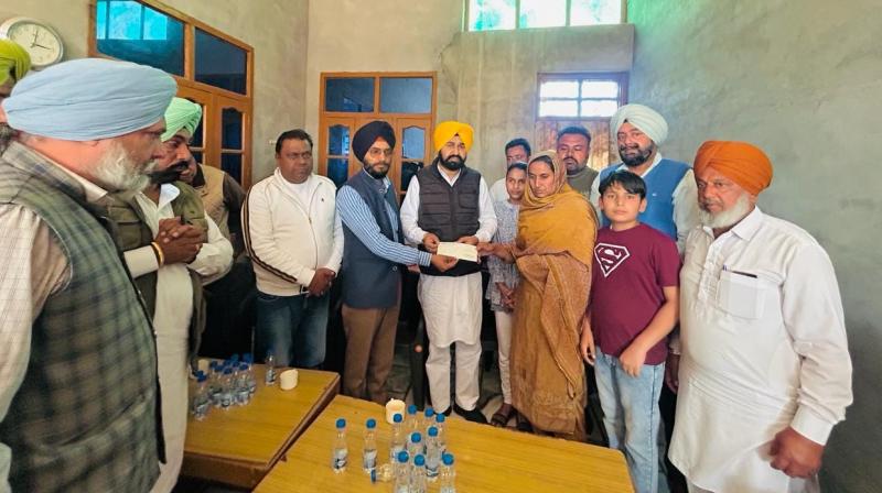 MLA Hand Over one crore check to family of martyr MLA Hand Over one crore check to family of martyr