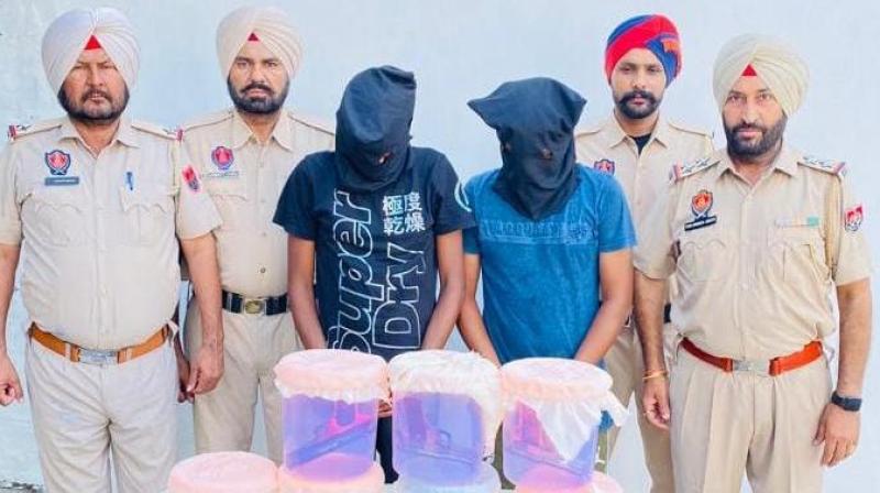 PUNJAB POLICE NABS TWO CLOSE AIDES OF GANGSTER GOLDY BRAR; 7 PISTOLS, POLICE UNIFORM RECOVERED PUNJAB POLICE NABS TWO CLOSE AIDES OF GANGSTER GOLDY BRAR; 7 PISTOLS, POLICE UNIFORM RECOVERED