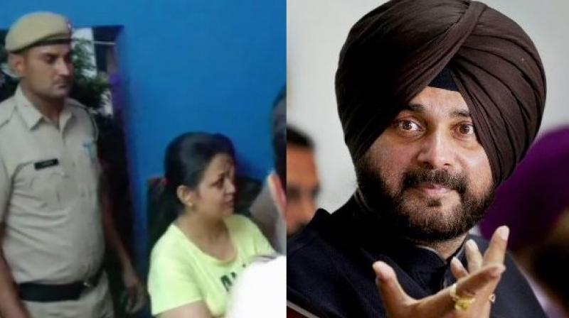 Women detained for throwing slipper at Navjot Singh Sidhu Women detained for throwing slipper at Navjot Singh Sidhu