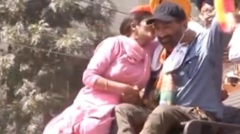 Women kiss Sunny Deol during road show Women kiss Sunny Deol during road show