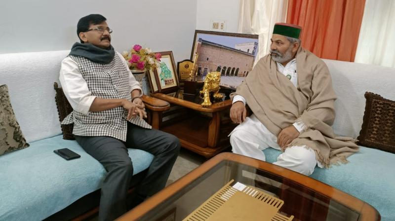 Sanjay Raut meets farmer leader Rakesh Tikait