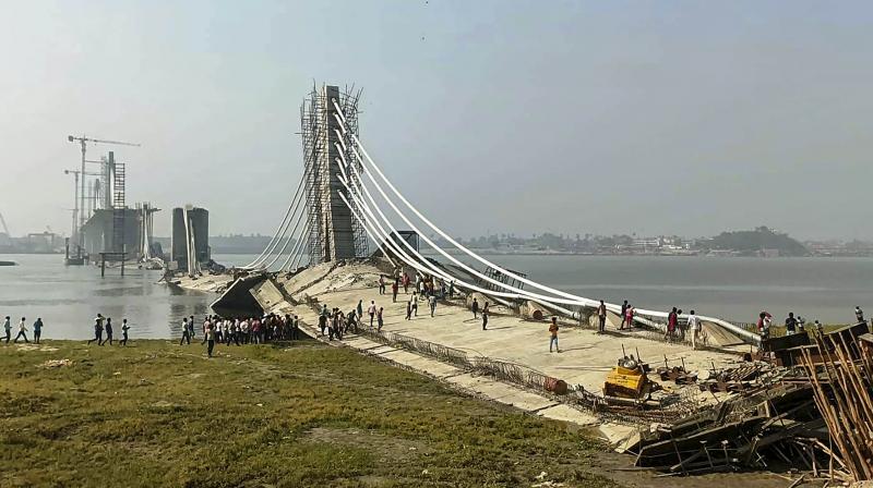Bhagalpur: A view of an under-construction bridge that collapsed on Sunday, in Bhagalpur, Monday, June 5, 2023. (PTI Photo) Bhagalpur: A view of an under-construction bridge that collapsed on Sunday, in Bhagalpur, Monday, June 5, 2023. (PTI Photo)