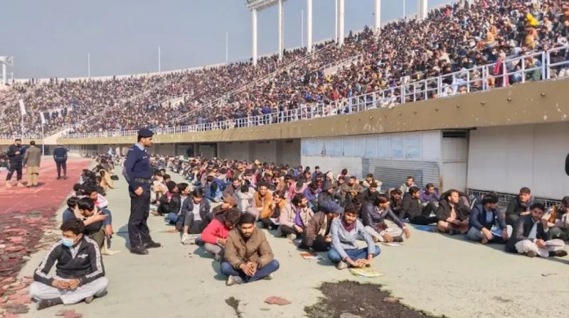 Pakistan's plight: 32,000 sit on the floor for 1,667 posts