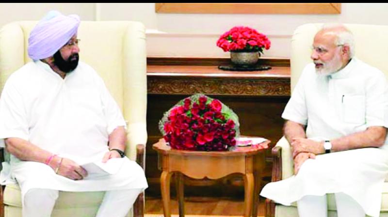 Captain Amarinder Singh Talking to Narendra Modi Captain Amarinder Singh Talking to Narendra Modi