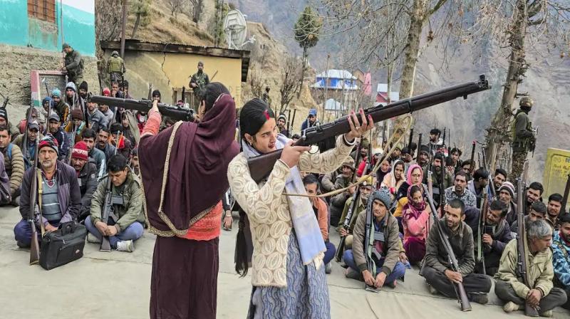 Village defense guards are guarding villages in the hilly region.