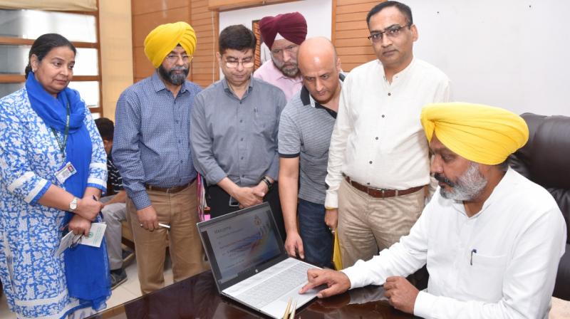 Finance Minister Harpal Singh Cheema during Web. launch