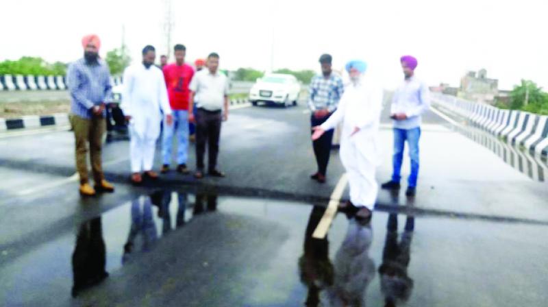 H. S. Phoolka And Engineer Reviewing the Bridge H. S. Phoolka And Engineer Reviewing the Bridge