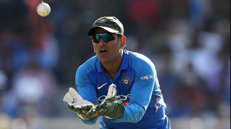 Ms dhoni using bats of different logo in world cup bas ss sg Ms dhoni using bats of different logo in world cup bas ss sg