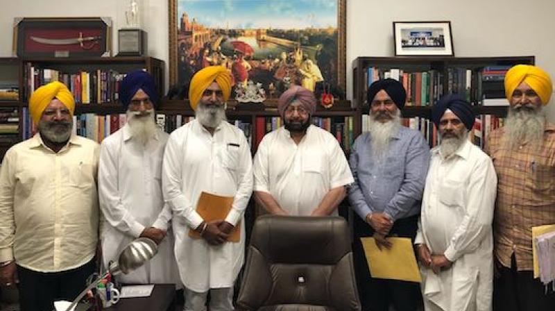 Capt. Amrinder Singh & Others