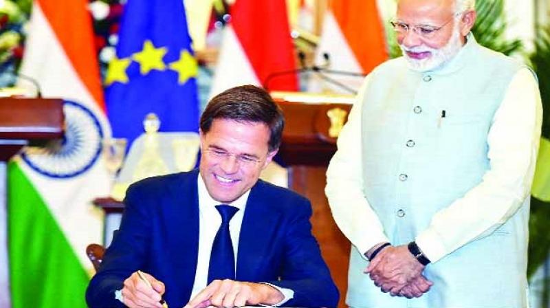 Agreement Sign between Narendra Modi & Mark Rut Agreement Sign between Narendra Modi & Mark Rut