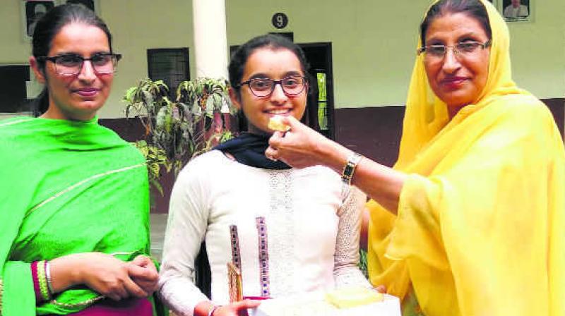 Farmer’s daughter tops district Farmer’s daughter tops district