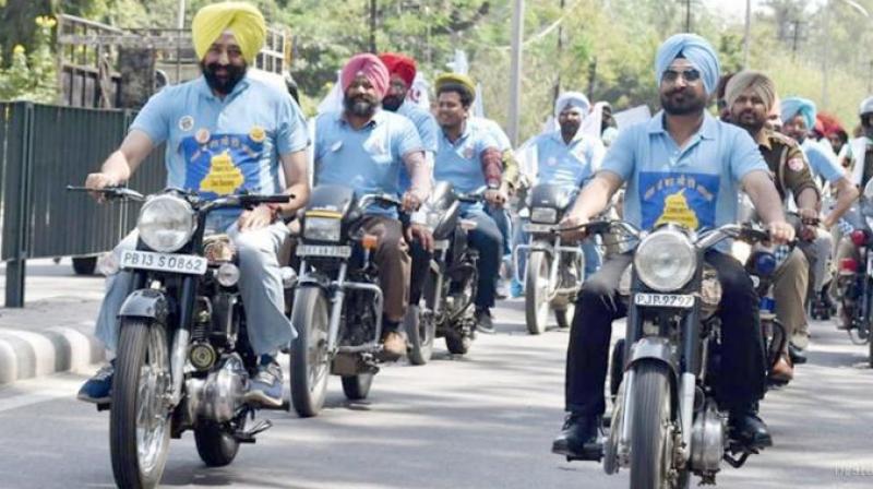 Bike rally to mark 550th birth anniversary of Sikhism founder Bike rally to mark 550th birth anniversary of Sikhism founder