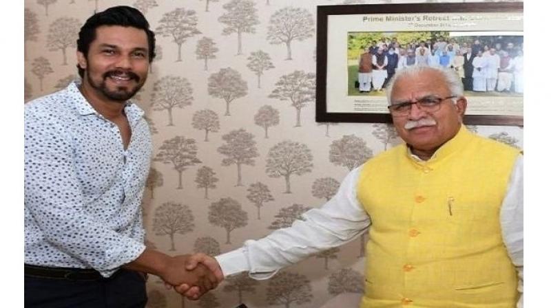 Randeep Hooda and Manohar Lal Khattar Randeep Hooda and Manohar Lal Khattar
