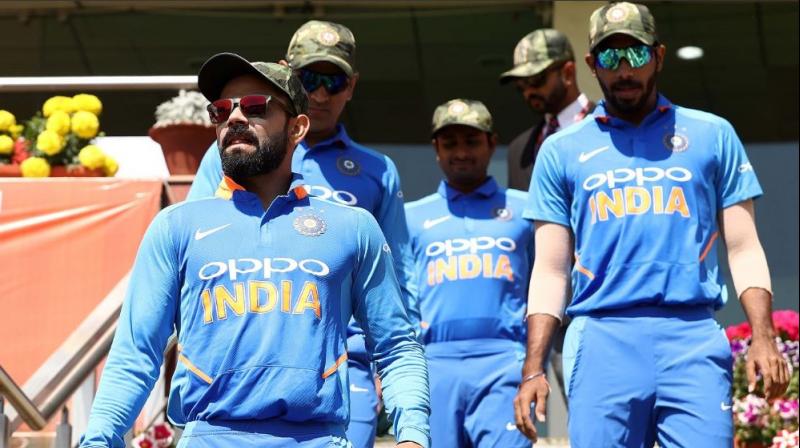 Indian cricket team wear army caps Indian cricket team wear army caps