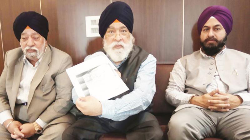 Sarna brothers addressing press conference Sarna brothers addressing press conference