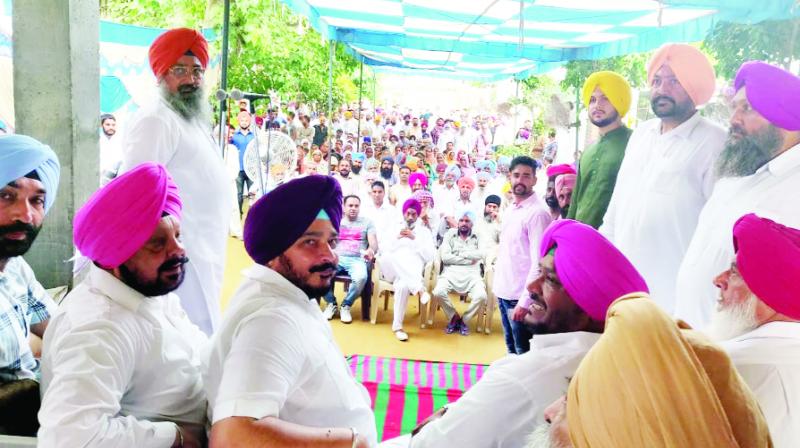 Sadhu Singh Dharamsot with party workers at Ludhiana