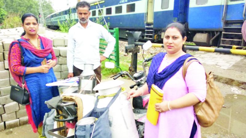 Employees of the Food Safety Department while conducting milk checks.