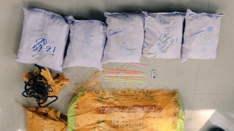 BSF recovered bag carrying 7 kg heroin BSF recovered bag carrying 7 kg heroin