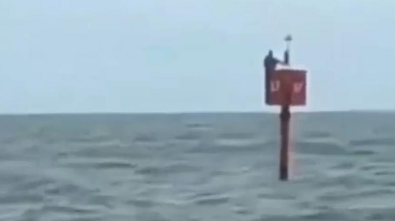 Fisherman survives by clinging to ocean buoy for two days Fisherman survives by clinging to ocean buoy for two days