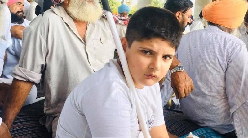 Despite being disabled, child is holding dharnas with farmers Despite being disabled, child is holding dharnas with farmers