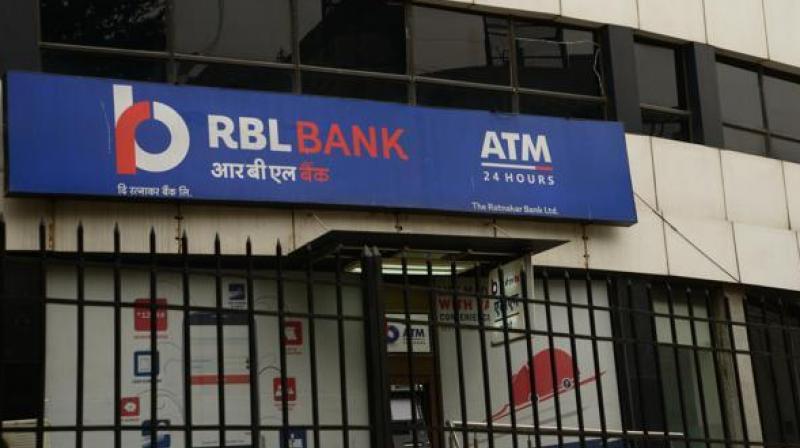 RBL net jumps 41 percent but warning on npas sends stock diving 14 percent