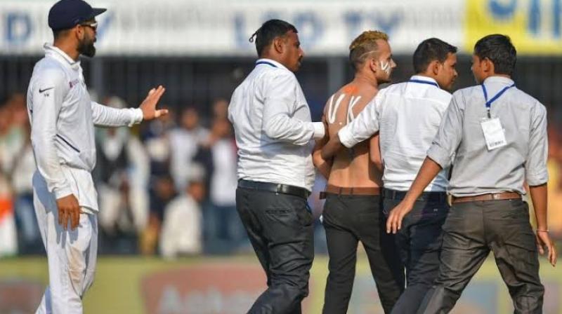 India vs Bangladesh: Virat Kohli fan sneaks onto field during Indore Test India vs Bangladesh: Virat Kohli fan sneaks onto field during Indore Test