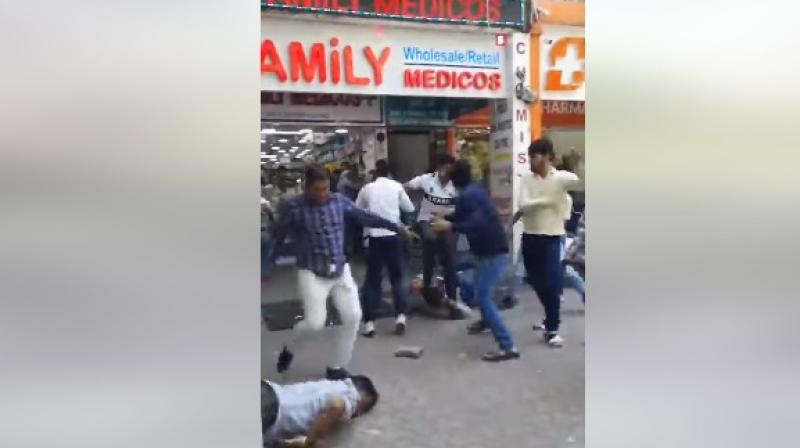 Clash between employees of Chemist shop in Chandigarh, kicked and punched Clash between employees of Chemist shop in Chandigarh, kicked and punched