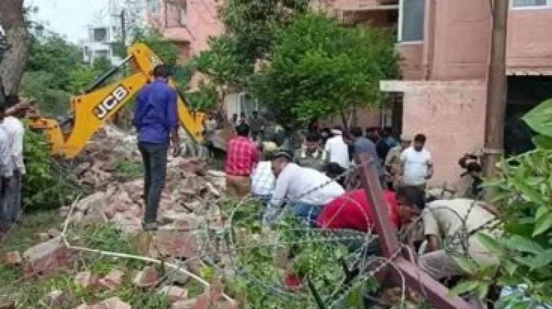  Four people died after the wall of a residential society collapsed in Noida