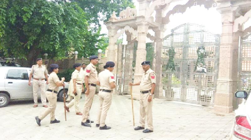 Police Standing Outside the Temple