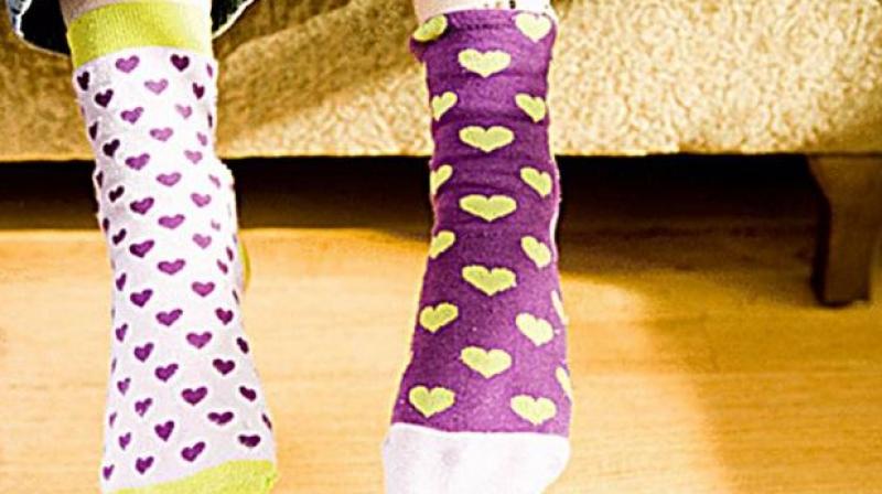 Why are wearing missmached sockes on March 21? Why are wearing missmached sockes on March 21?