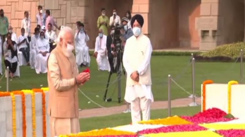 PM Modi pays floral tribute to Mahatma Gandhi at Raj Ghat PM Modi pays floral tribute to Mahatma Gandhi at Raj Ghat