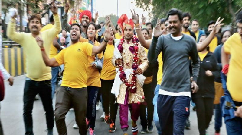 The groom ran 11 km to promote fitness and went for a round 50 baraatis also ran The groom ran 11 km to promote fitness and went for a round 50 baraatis also ran