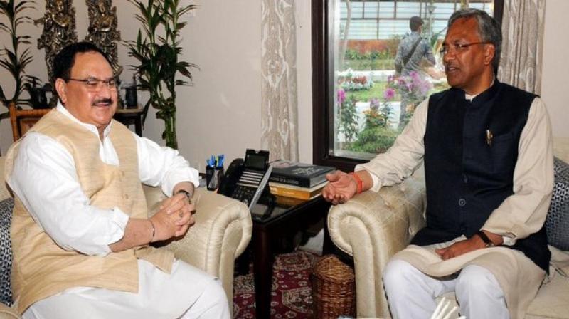 Jp Nadda and Trivendra Rawat Jp Nadda and Trivendra Rawat