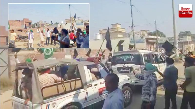 People raise black flags, slogans against Sukhbir Badal