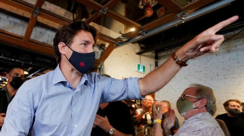 Canadian PM Justin Trudeau hit by stones on campaign trail