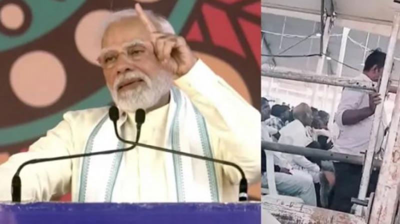 Man was seen opening the nuts and bolts of the pandal At PM Modi's rally Man was seen opening the nuts and bolts of the pandal At PM Modi's rally