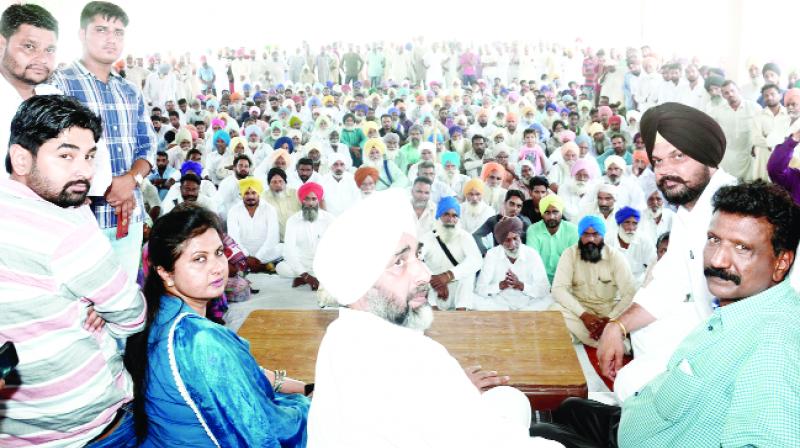 Manpreet Singh Badal and others during the rally