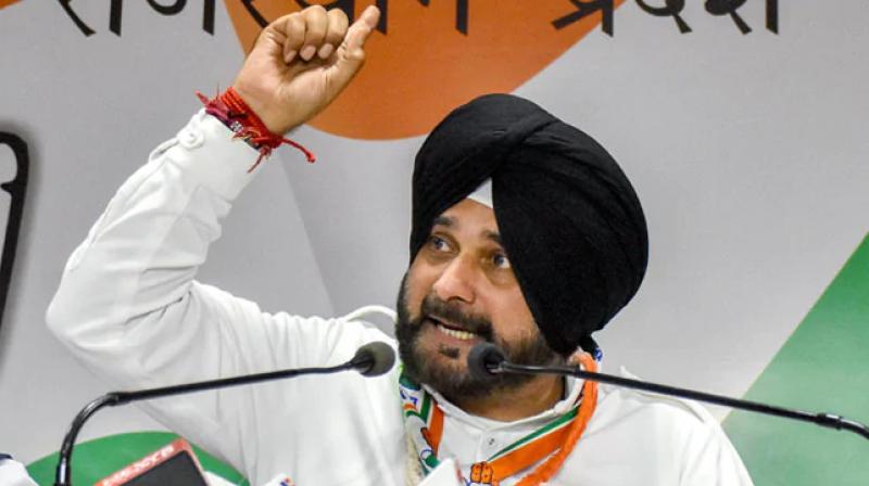 Election Commission seeks response from Sidhu on personal remarks against Modi Election Commission seeks response from Sidhu on personal remarks against Modi